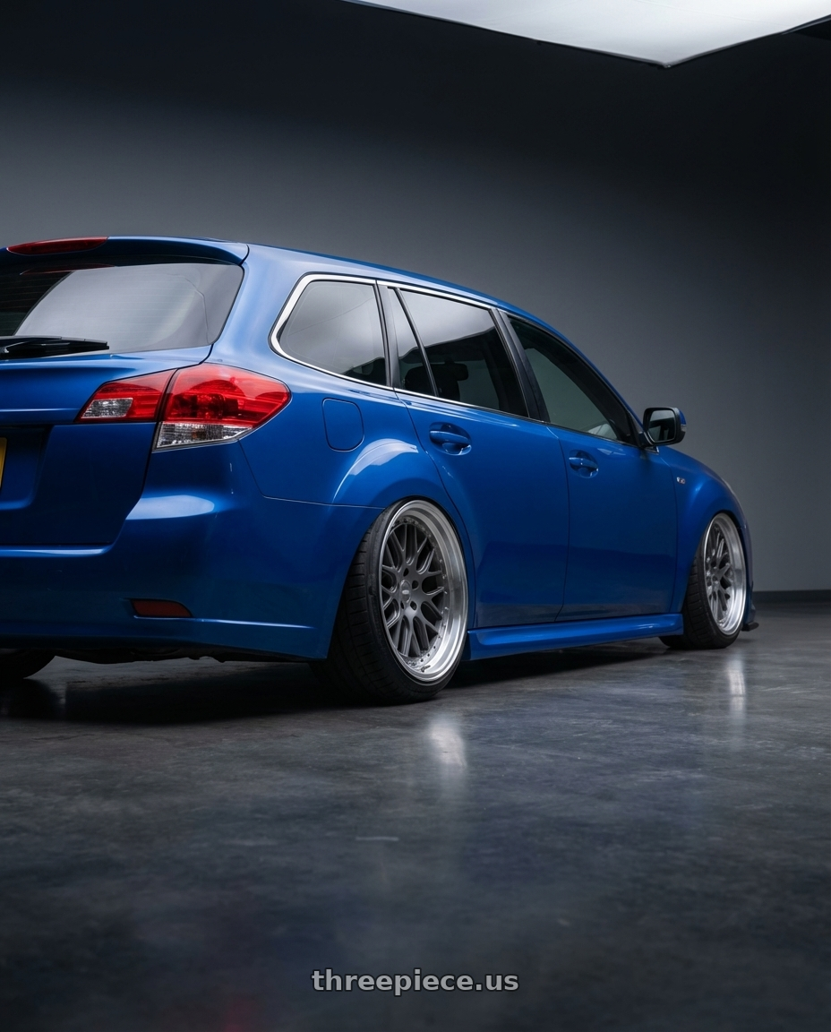 2013 Subaru Legacy tS with ESR Wheels CS SERIES CS01 5x108 19x9.5 +22 Matte Graphite wheels rear three quarter view meaty tires