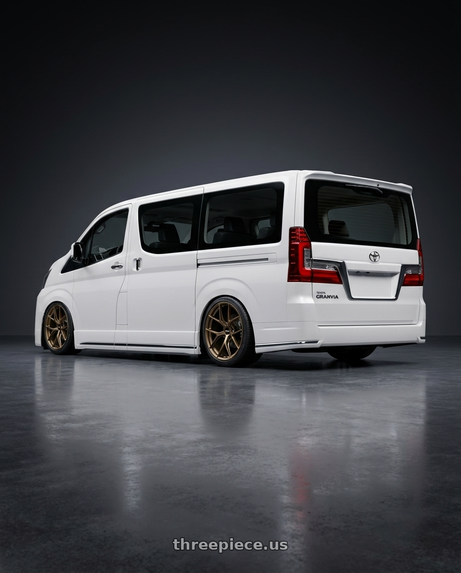 2026 Toyota granvia with BBS FI-R CL 20x9.0+52 Matte Bronze wheels rear three quarter view square tires
