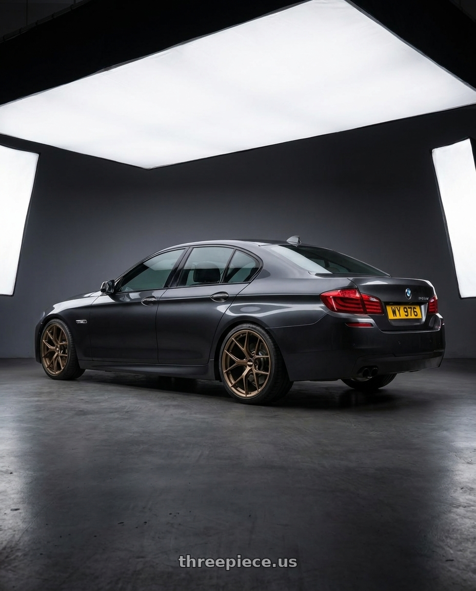 2014 bmw 520d f10 with BBS FI-R CL 20x9.0+52 Matte Bronze wheels rear three quarter view slight stretch tires