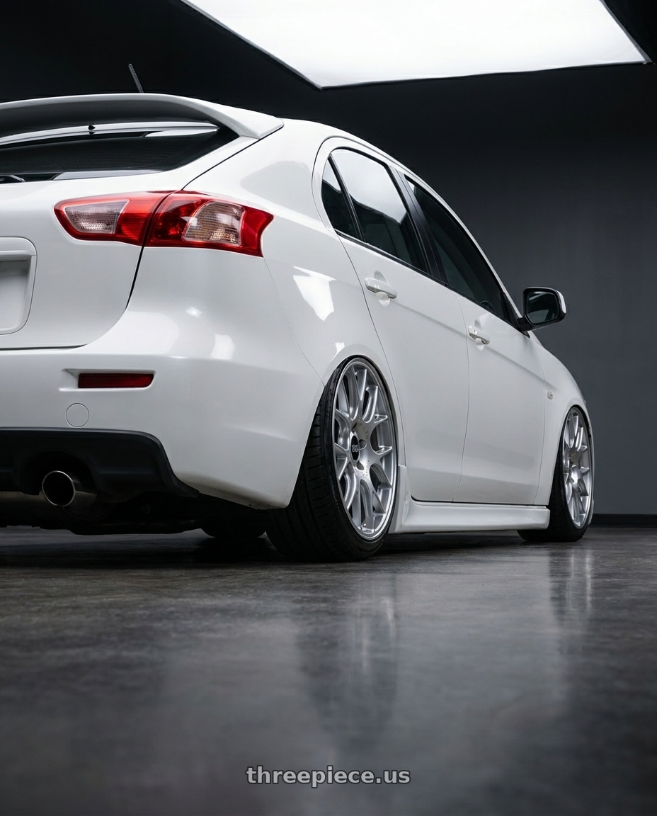 2014 Mitsubishi lancer sportback with BBS CH-R 5x114.3 19x8 +38 Brilliant Silver Polished Rim Protector wheels rear three quarter view slight stretch tires
