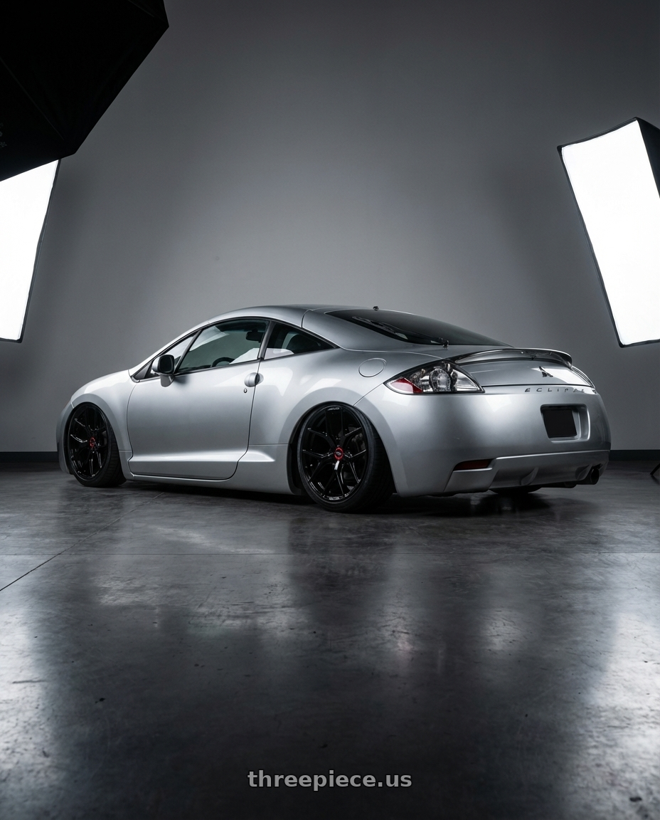 2010 Mitsubishi Eclipse with Vossen HF-5 19x8.5 / 5x114.3 / ET32 / Flat Face / 73.1 - Gloss Black Wheel - HF5-9N60 wheels rear three quarter view slight stretch tires