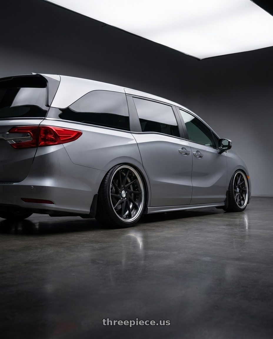 2024 Honda Odyssey with Work Gnosis Cvs 5x120 20x8+38 W Disk Matte Black wheels rear three quarter view extreme stretch tires