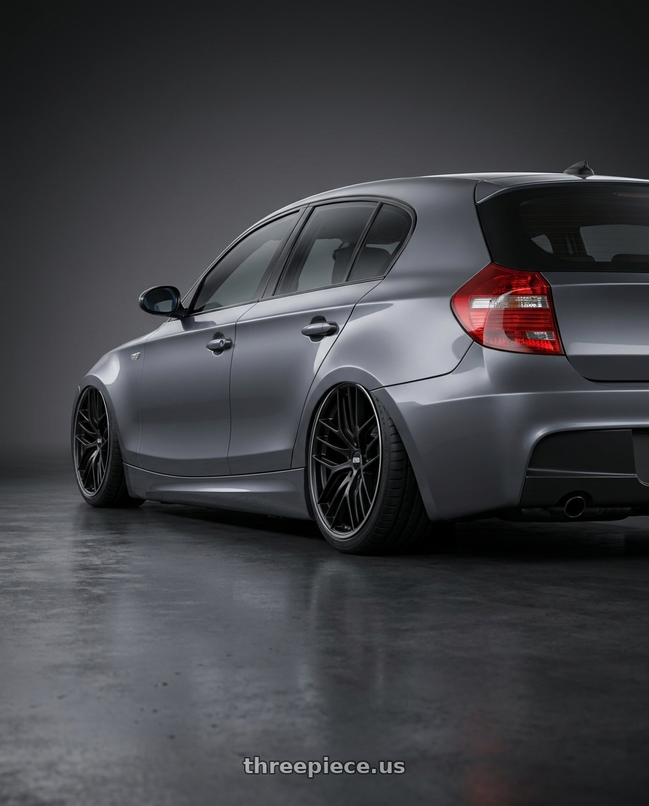 2012 BMW 1 Series E82 with BBS CC-R 5x120 19x9.0+48 Satin Black wheels rear three quarter view slight stretch tires
