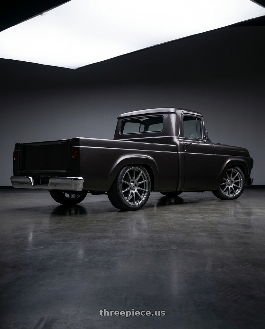 1960 ford f100 with Forgestar CF10 5x120 20x9 +38 Gloss Anthracite wheels rear three quarter view square tires