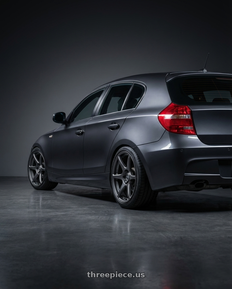 2012 BMW 1 Series E82 with Kansei K11G Tandem 5X120 18x10.5 12 Gunmetal wheels rear three quarter view square tires
