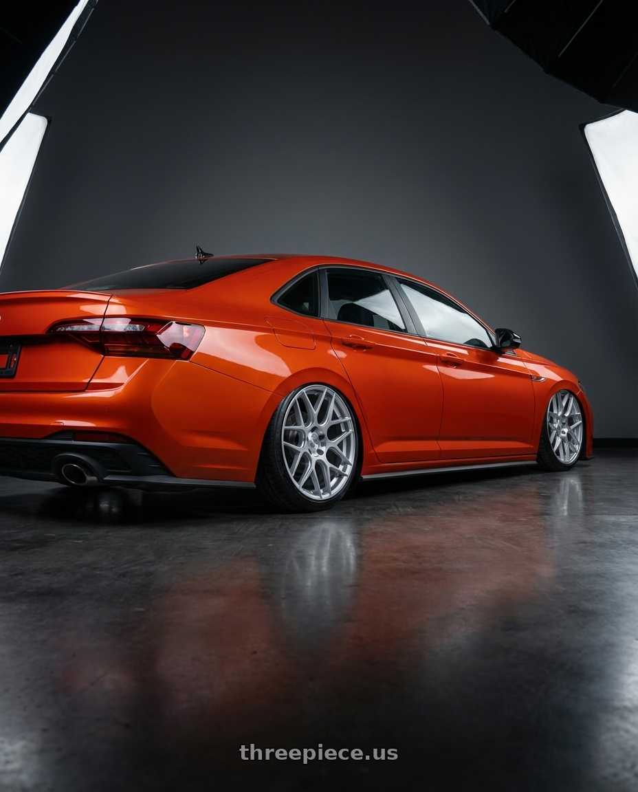 2023 Volkswagen Jetta GLI MK7 with Aodhan AFF2 5x112 19x9.5+35 Gloss Silver Machined Face wheels rear three quarter view slight stretch tires