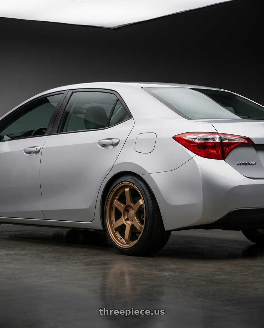 2016 Toyota Corolla with 9six9 SIX-1 5x114.3 18X10 +20 Matte Bronze wheels rear three quarter view square tires