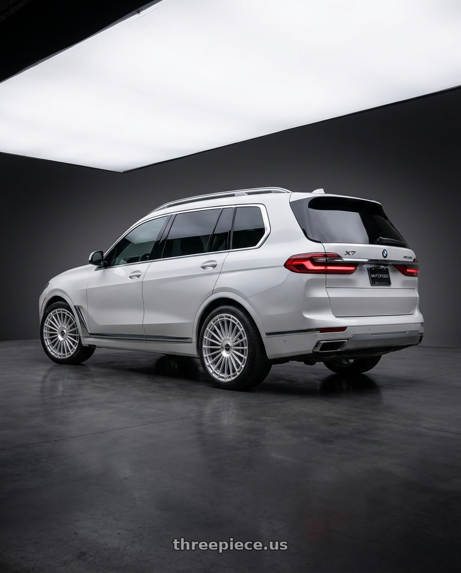 2025 BMW X7 with MV Forged MVF40 5x112 24x10 +30 Diamond Silver wheels rear three quarter view square tires