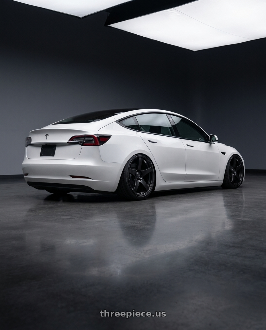 2023 Tesla Model 3 with Ssr Gtv01 5x114.3 19x8.5+38  FLAT BLACK wheels rear three quarter view slight stretch tires