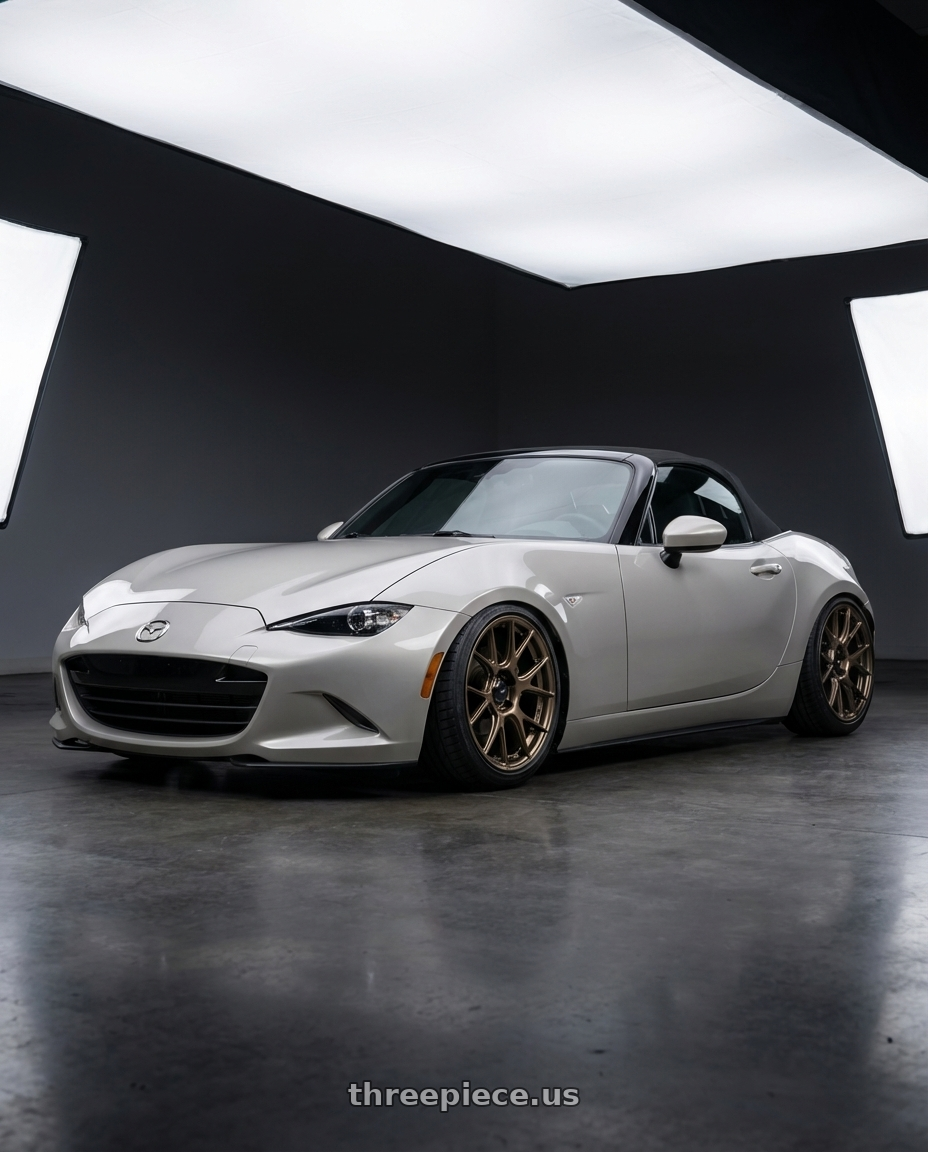 2021 Mazda MX-5 Miata ND with Konig Ampliform 5x114.3 17x8+40 Gloss Bronze wheels front three quarter view stanced stance