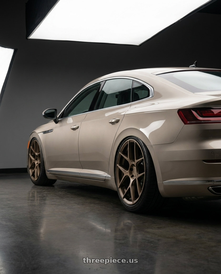 2021 Vw Arteon with Aodhan AFF2 5x114.3 19x9.5+35 Matte Bronze wheels rear three quarter view slight stretch tires