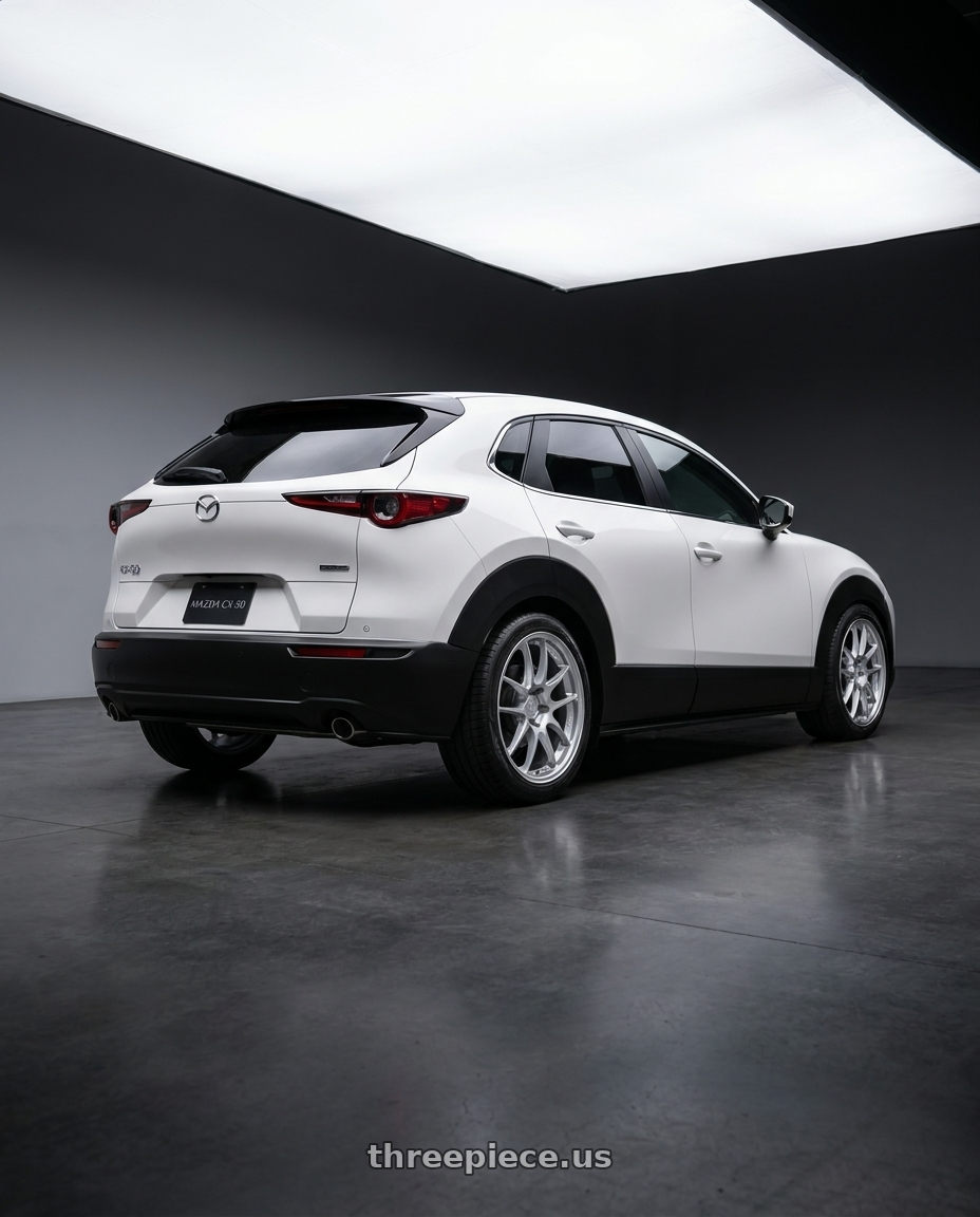 2024 Mazda CX-30 with Enkei PF01 5x114.3 18x8.5+35 Silver wheels rear three quarter view slight stretch tires