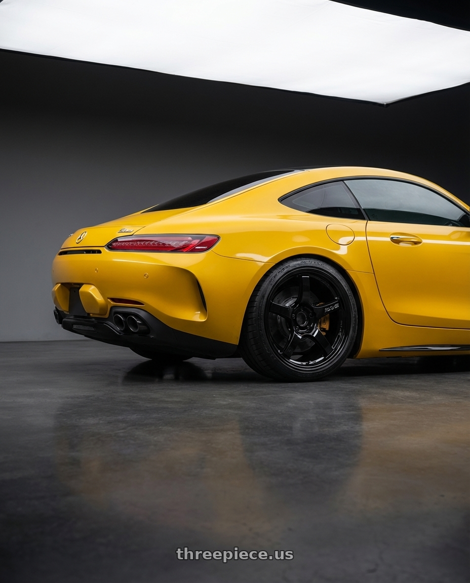 2019 Mercedes-Benz AMG GT with Gram Lights 57CR 5x112 19x10.5+22 Glossy Black wheels rear three quarter view square tires