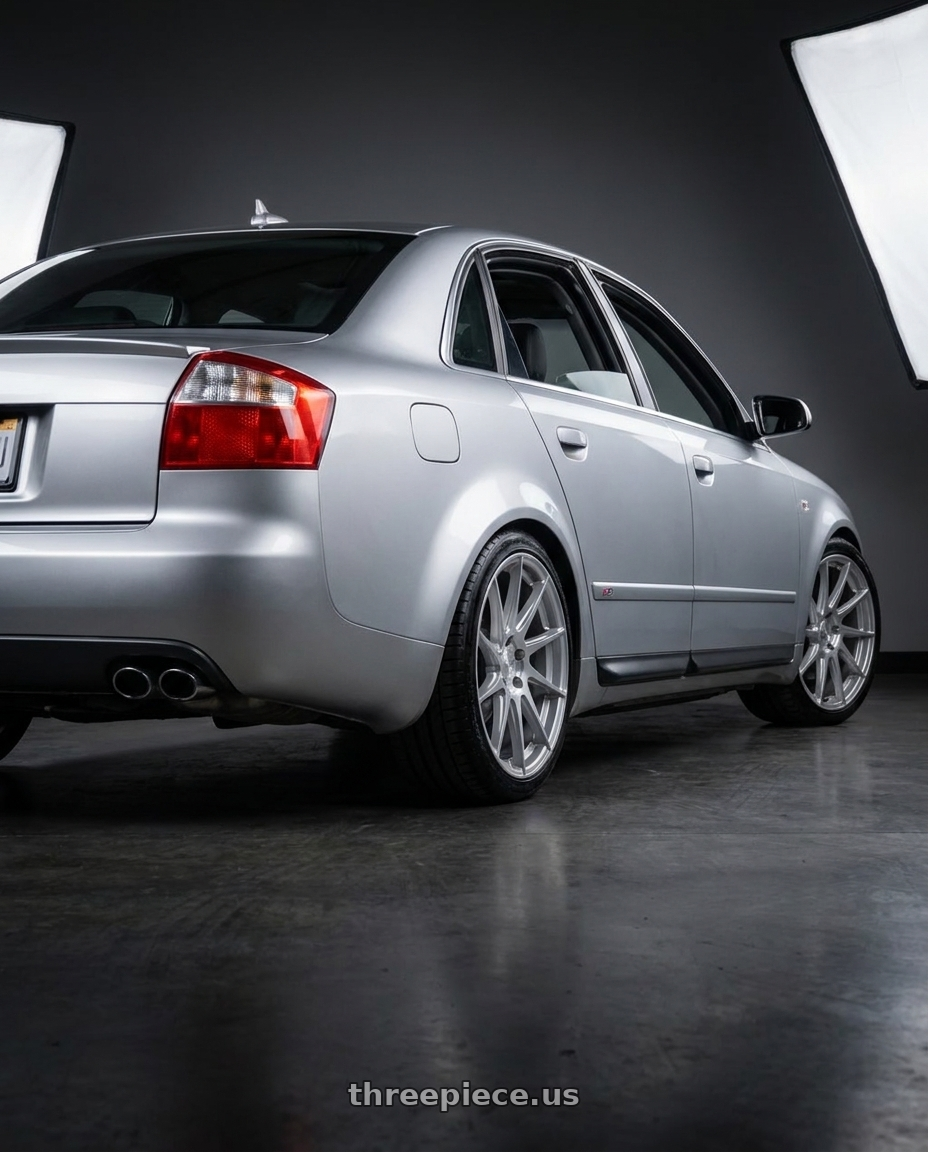 Silver 2005 Audi S4 with Aodhan AH09 5x112 18x8.5 +35 Gloss Silver Machined Face wheels rear three quarter view square tires