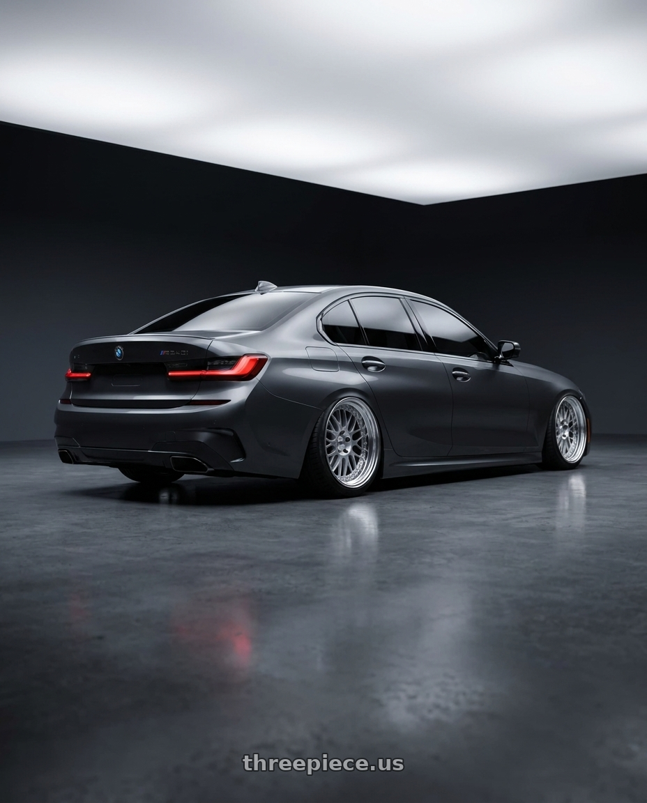 2020 bmw m340i with Work Meister M1 3p 5x112 19x8.5+30 O Disk Silver wheels rear three quarter view slight stretch tires