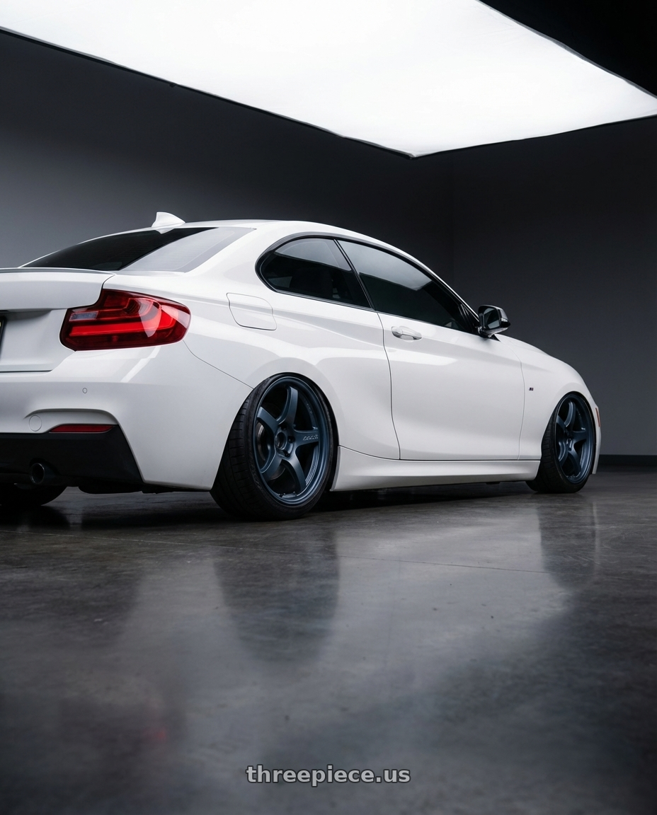 2018 BMW 2 Series F22 with Gram Lights 57CR 5x120 19x10.5+22 Gunblue II wheels rear three quarter view slight stretch tires