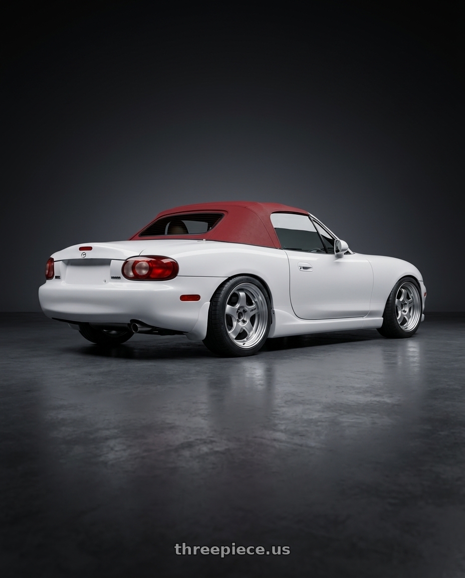 2003 mazda miata with Work Meister S1 2P 4x100 15x5.5+38 R Disk Silver wheels rear three quarter view square tires
