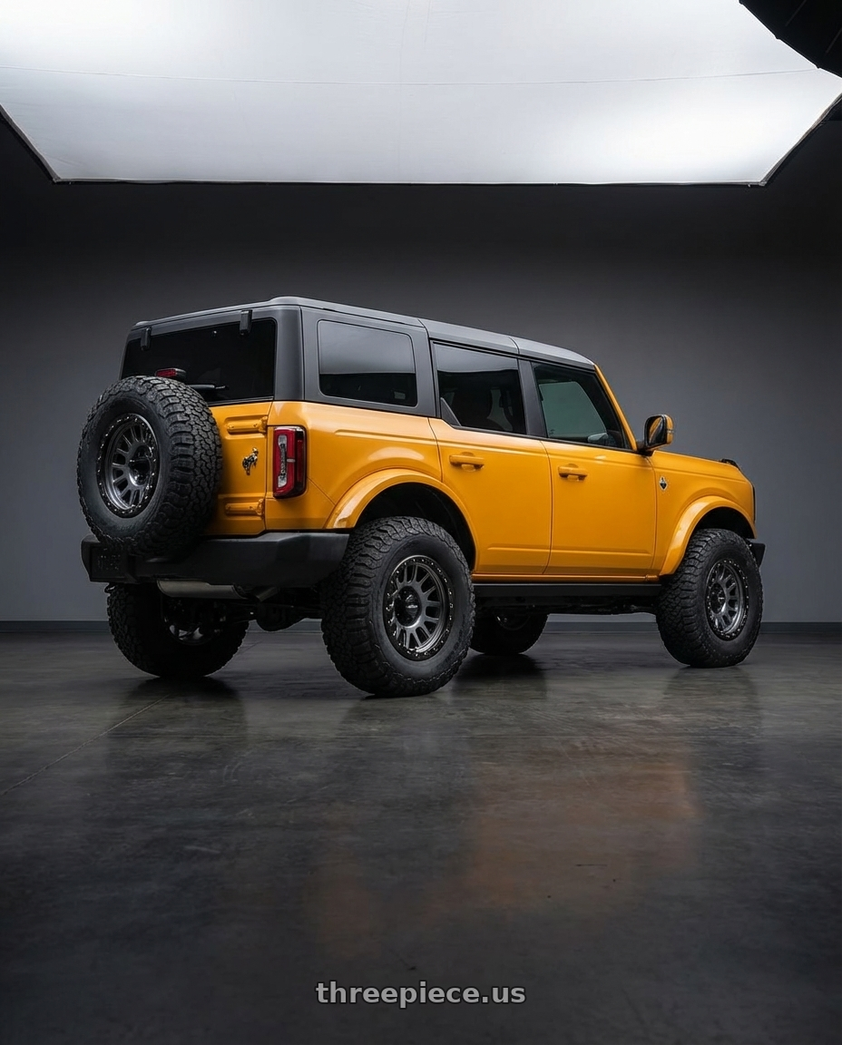 2024 Ford Bronco with Vision Off-Road 111 Nemesis 6x139.7 17x9-12 Gunmetal wheels rear three quarter view meaty tires