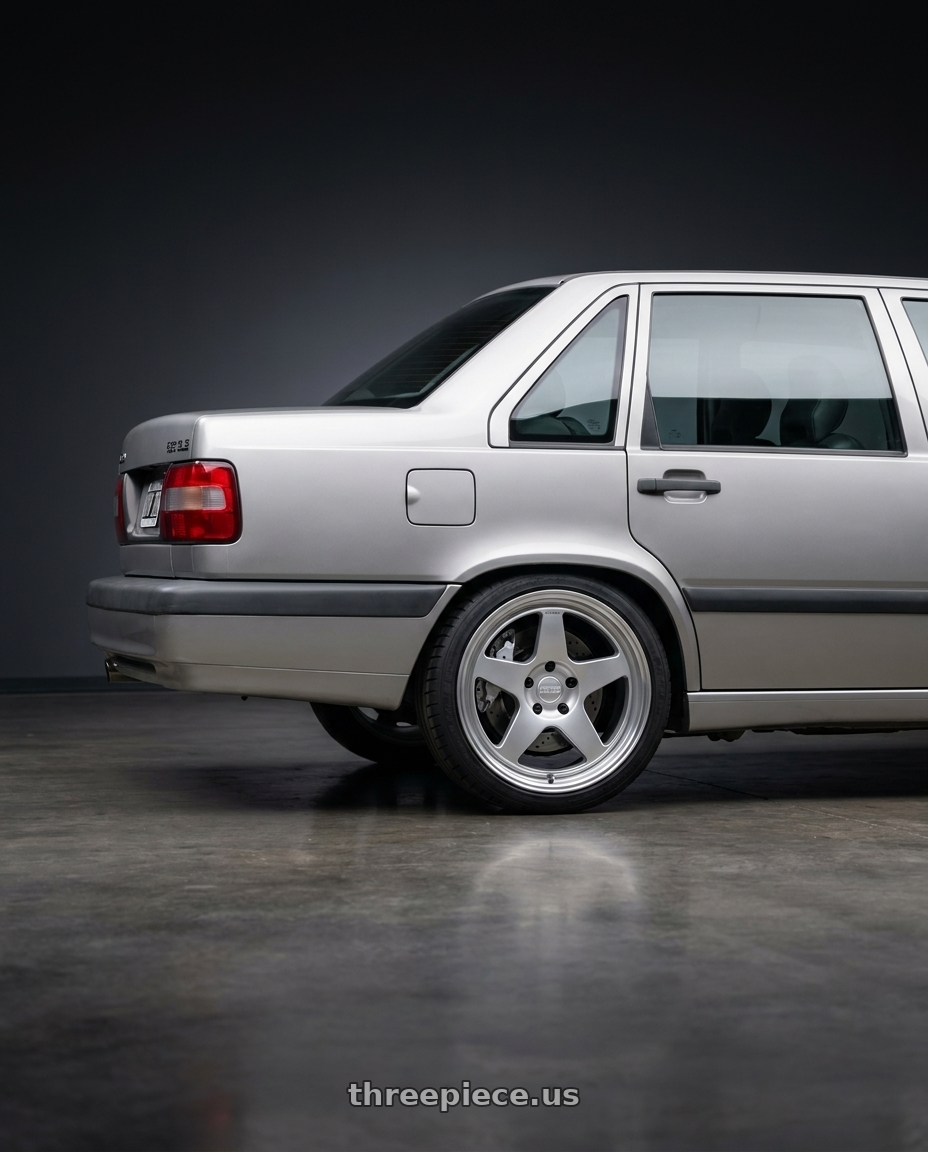 1996 Volvo 850 GLE, Silver, Big brake kit silver 6 piston calipers. with Kansei K12H KNP 5X108 18x8.5 35 Hyper Silver wheels rear three quarter view square tires
