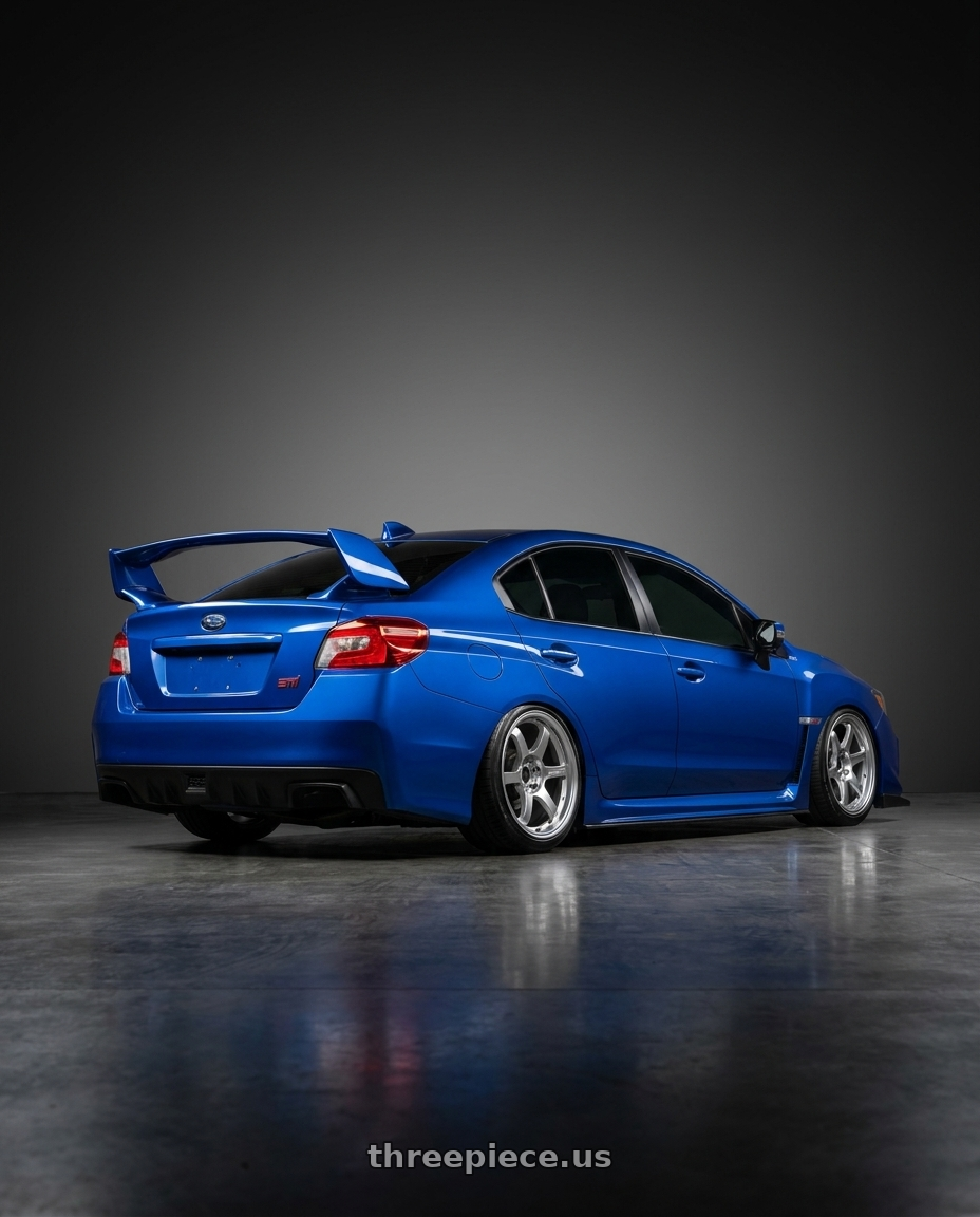 2017 Subaru wrx sti with Gram Lights 57DR 5x114.3 18x9.5+38 Grace Silver wheels rear three quarter view square tires