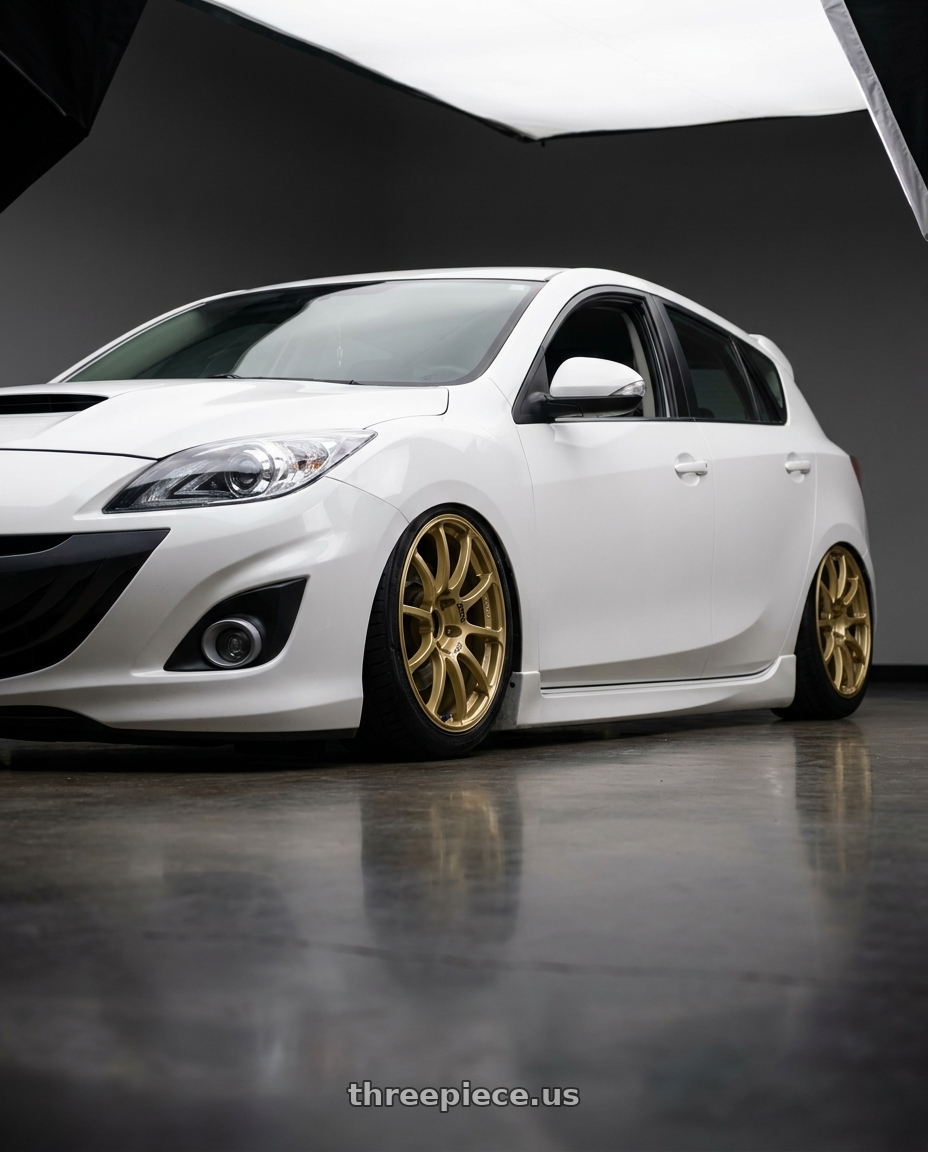 2012 Mazda Mazdaspeed3 with Advan RCIII 5x114.3 18x8.5+38 Gold wheels