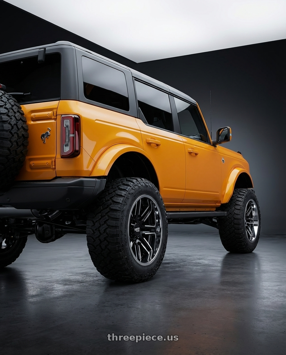 2024 Ford Bronco with Moto Metal MO202 6X139.7 20X12 -44 GLOSS BLACK MACHINED CENTER CHROME LIP wheels rear three quarter view meaty tires