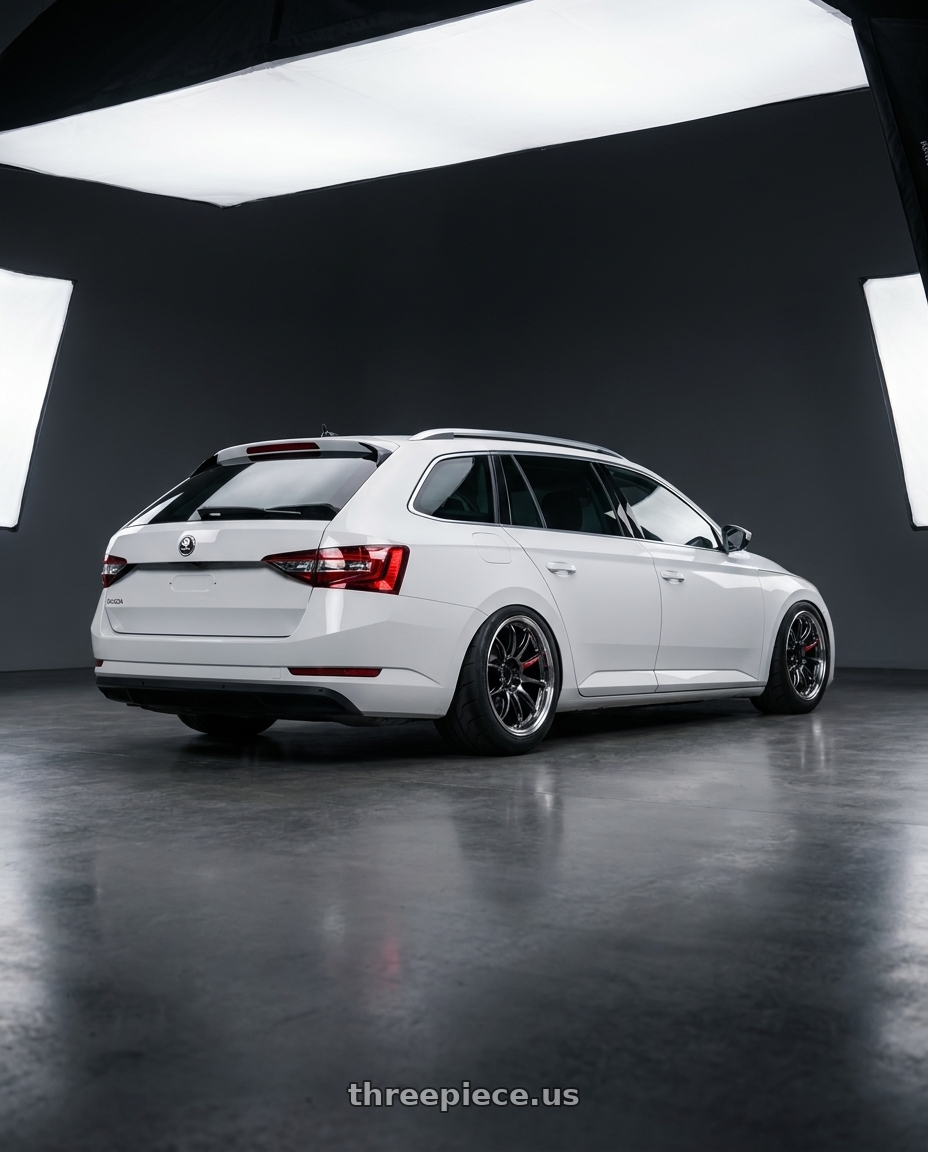 2019 Skoda superb with Work Emotion Zr10 4x100 15x5 +48 Glim Black Diamond Rim cut wheels rear three quarter view meaty tires