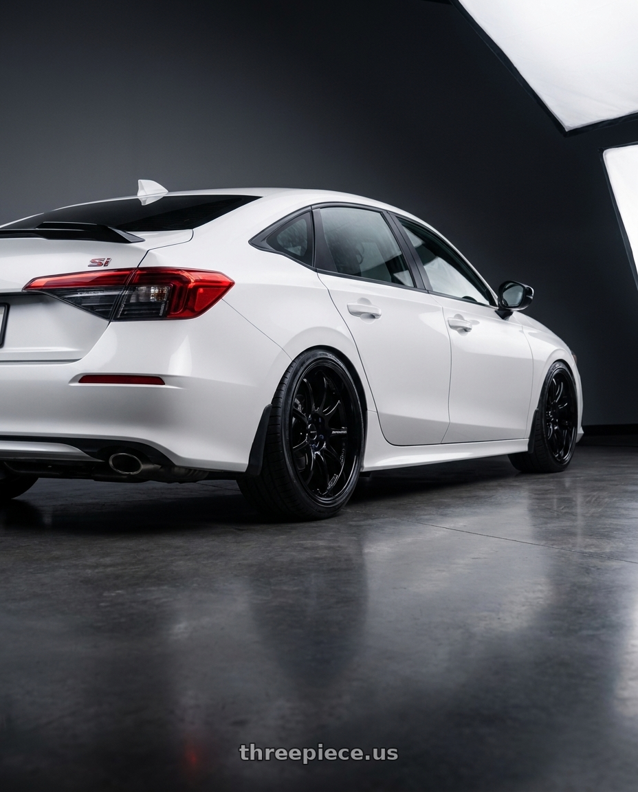 2026 Honda Civic Si with Work Emotion D9r 5x100 18x9.5 +30 Black wheels rear three quarter view slight stretch tires