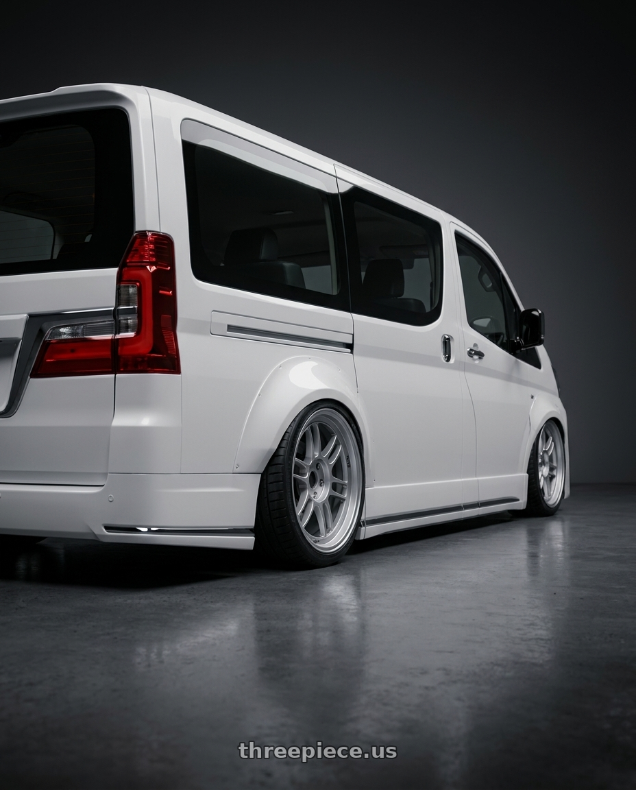 2026 Toyota granvia with Enkei RPF1 5x112 18x7.5+48 Silver wheels rear three quarter view square tires