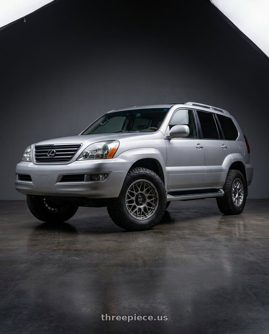 2006 Lexus GX470 with KMC KM722 TECHNIC 6X139.7 20X9 +18 ANTHRACITE wheels front three quarter view raised stance