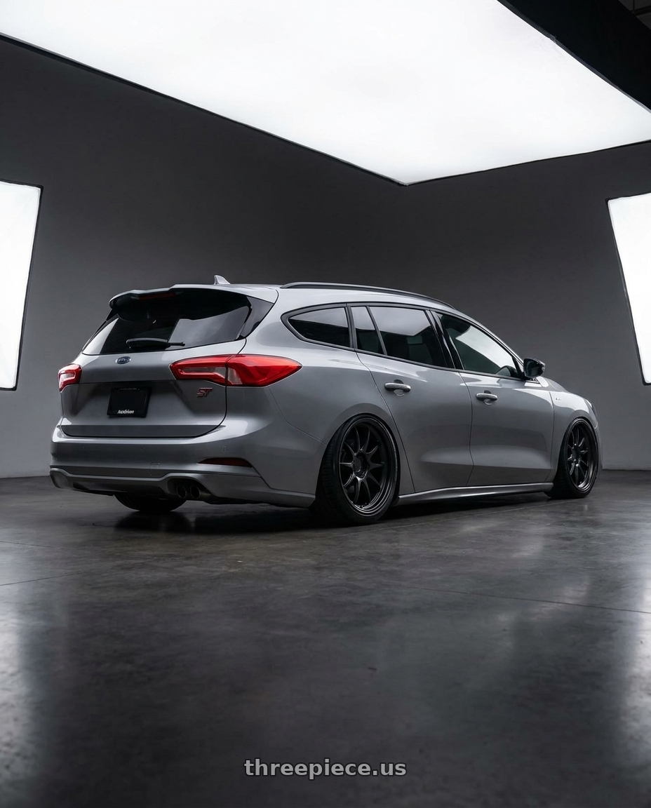 2024 Focus St Line Wagon with Aodhan AFF2 5x114.3 19x9.5+35 Matte Black wheels rear three quarter view slight stretch tires