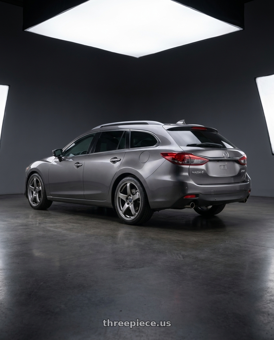 2019 Mazda 6 wagon with Enkei PF05 5x114.3 19x8.5+38 Dark Silver wheels rear three quarter view square tires