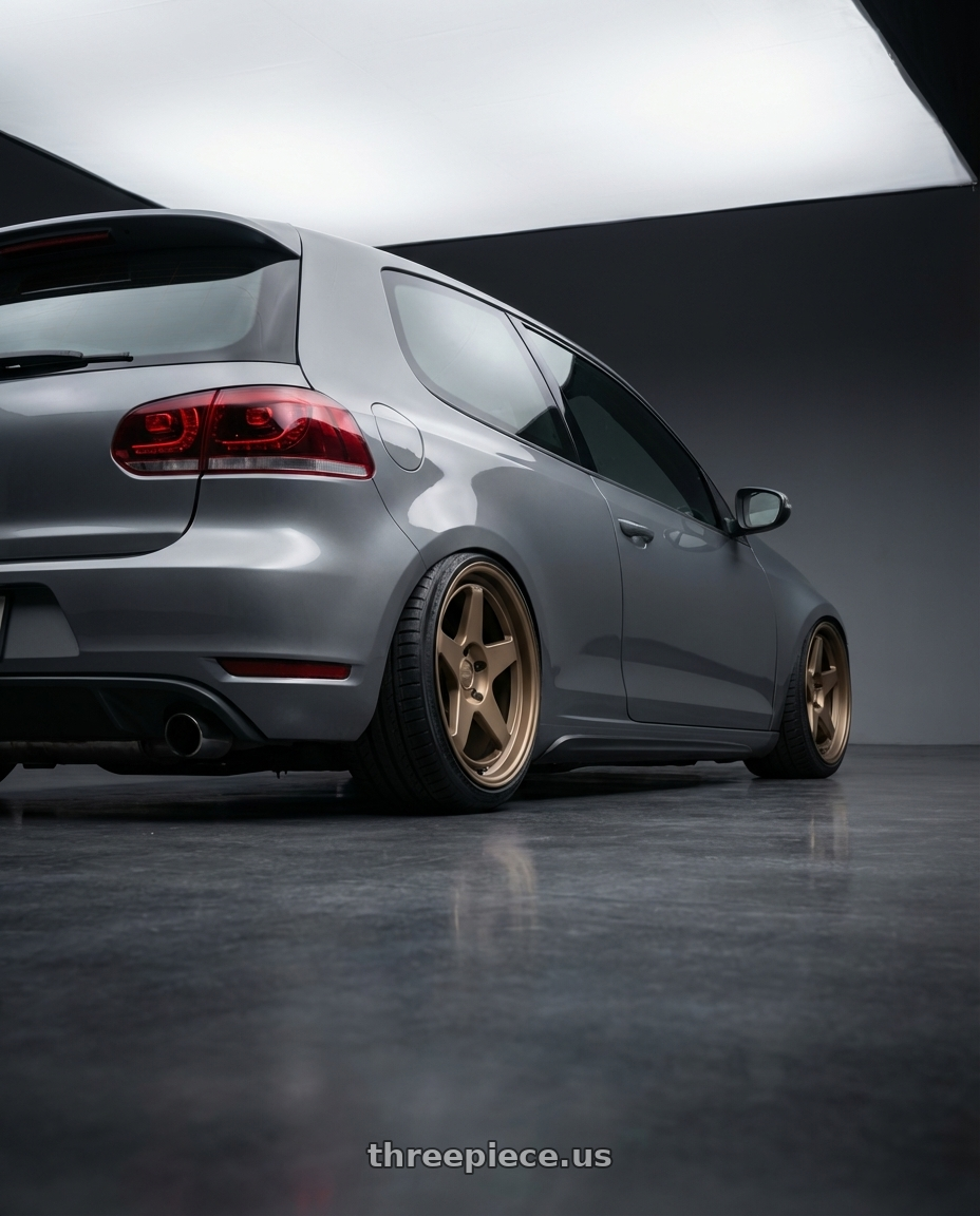 2013 Volkswagen GTI MK6 with Kansei K12B KNP 5X112 18x8.5 35 Bronze wheels rear three quarter view slight stretch tires