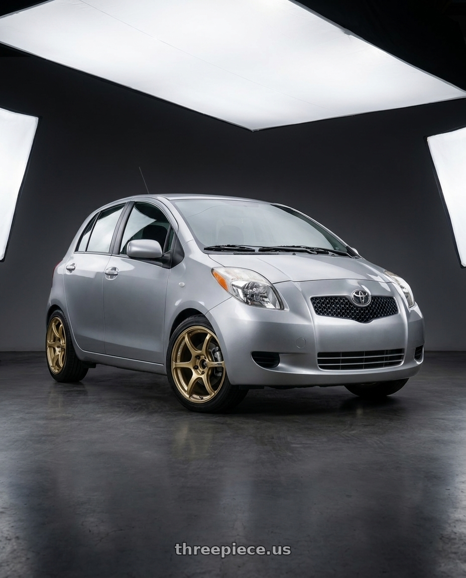 2006 Toyota Yaris with Advan RGIII 4x100 18x7.0+42 Gold wheels