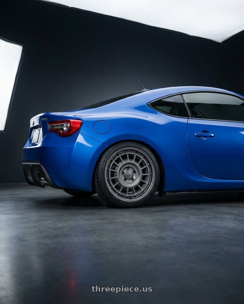2017 Subaru BRZ with fifteen52 ALPEN MX 5x100 17x8 +38 FROSTED GRAPHITE (SATIN GREY) wheels rear three quarter view square tires