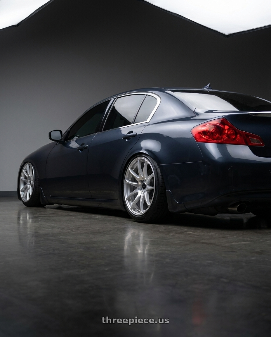 2008 INFINITI G35 with Vors TR4 5x114.3 17x8  +35 Silver Machine Face wheels rear three quarter view square tires