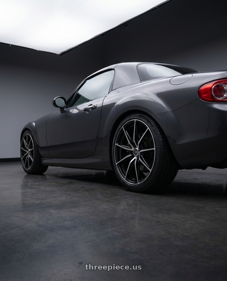 2014 Mazda Miata with Enkei DRACO 5x114.3 17x7.5+38 Black Machined wheels rear three quarter view square tires