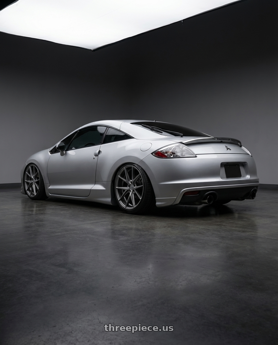 2010 Mitsubishi Eclipse with Niche 1PC M116 MISANO 5X114.3 19X8.5 +45 MATTE GUN METAL wheels rear three quarter view slight stretch tires