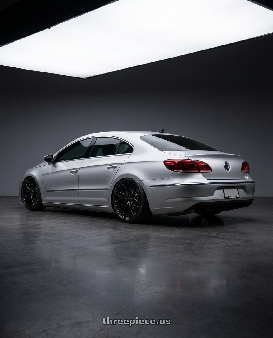 2015 Volkswagen CC with Avant Garde Wheels M520R 5X112 19x9.5 +40 Gloss Black wheels rear three quarter view slight stretch tires