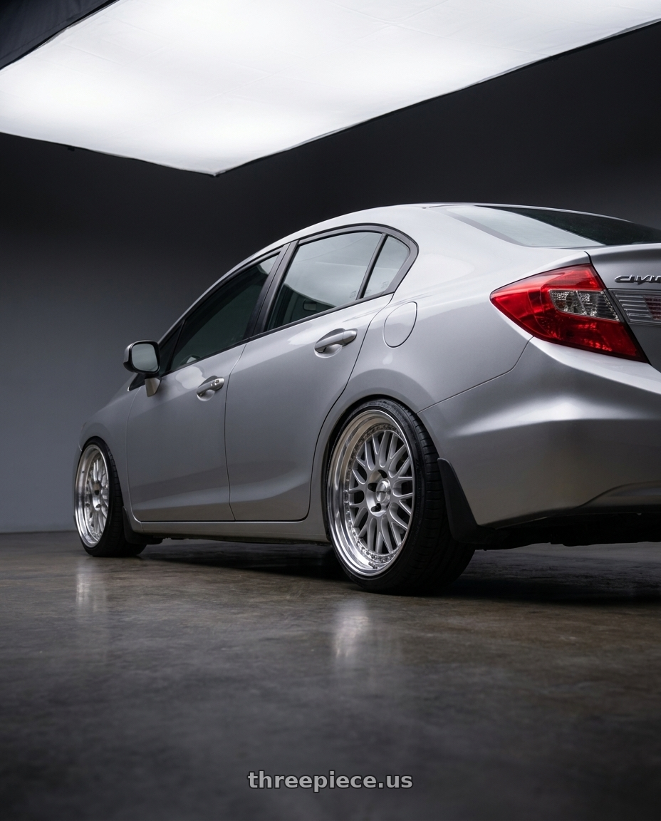 2012 honda civic EX with Work Meister M1 3p 5x114.3 16x6.5+37 O Disk Silver wheels rear three quarter view slight stretch tires