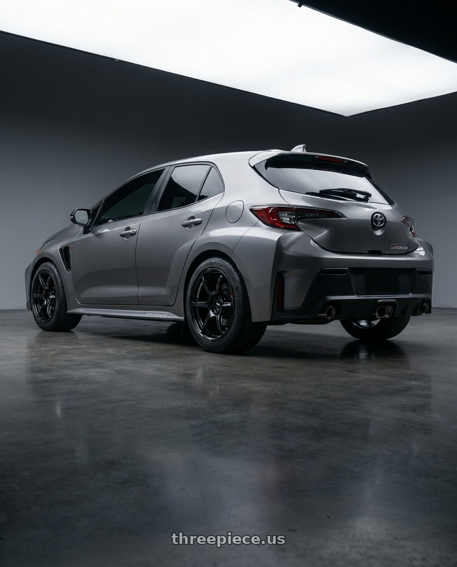 GR Corolla 2023 with Advan RGIII 5x114.3 18x9.0+25 Gloss Black wheels rear three quarter view meaty tires