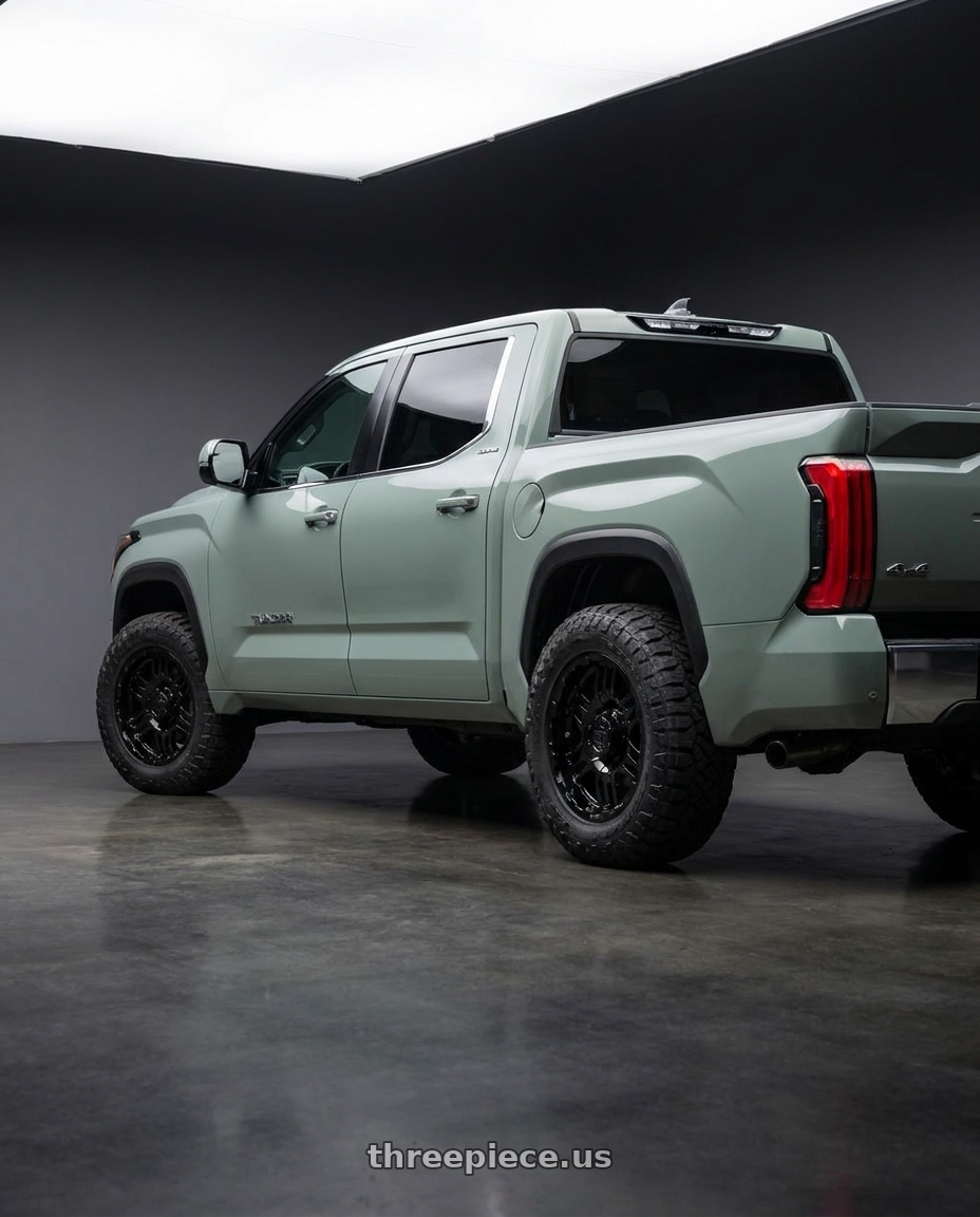 2024 Toyota Tundra with Gear Off Road 713B 6x139.7 20x9 +10 Gloss Black wheels rear three quarter view meaty tires