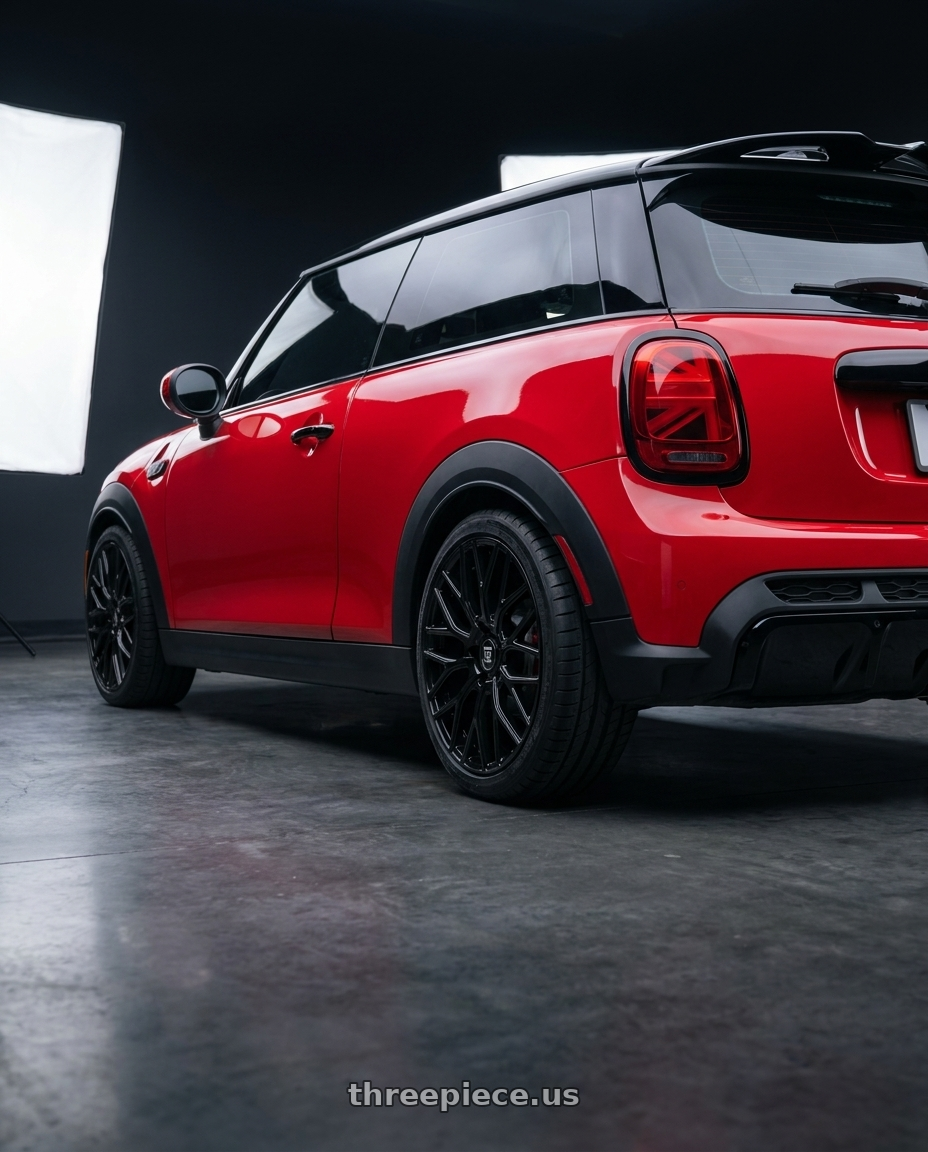 2025 mini jcw red with TOUREN TR76 3276 5x112 18x8 +35 GLOSS BLACK wheels rear three quarter view square tires