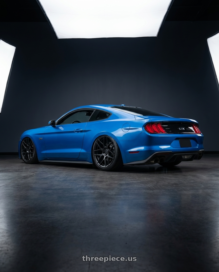 2022 Ford Mustang GT with Aodhan AFF2 5x114.3 20x9+32 Matte Black wheels rear three quarter view slight stretch tires