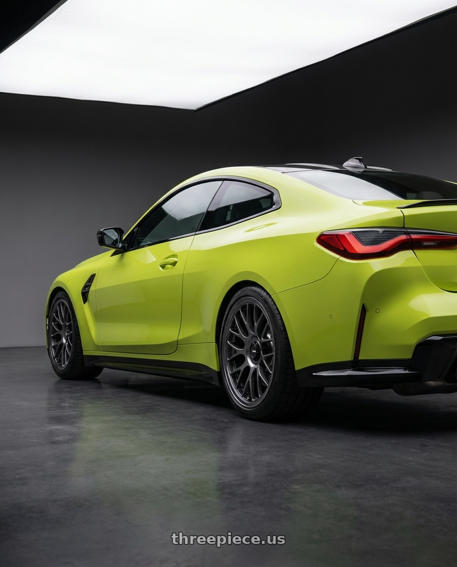 2024 BMW M4 G82 with Konig MRK1 5X112 19x9+42 Hyper Carbon - Gloss Black Gear Cap/Logo/Cover Plate wheels rear three quarter view square tires