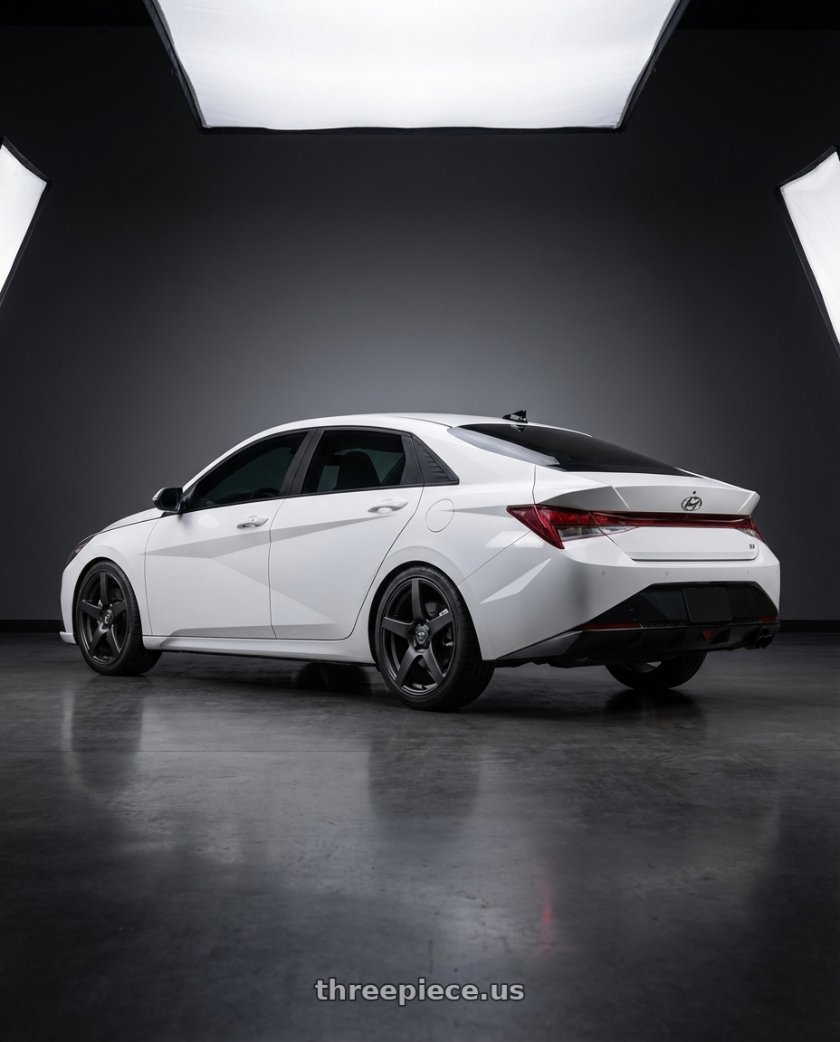 2024 Hyundai Elantra N with Forgestar CF5 5x114.3 19x9 +35 Satin Black wheels rear three quarter view square tires