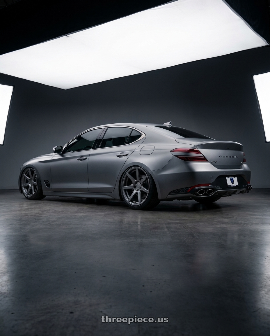 2024 Genesis g70 with Rohana RC7 5x114.3 20x10+40 Matte Graphite wheels rear three quarter view slight stretch tires