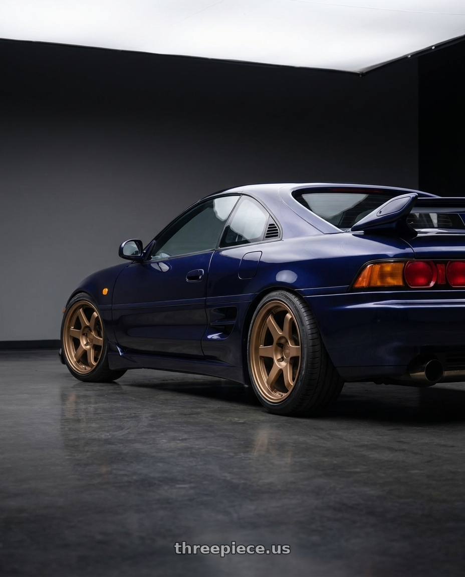 1998 toyota mr2 with 9six9 SIX-1 5x100 17X9 +35 Matte Bronze wheels rear three quarter view slight stretch tires