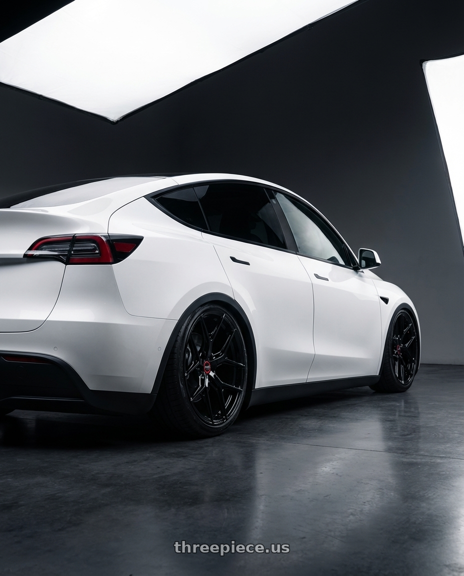 2024 Tesla Model Y with Vossen HF-5 20x10.5 / 5x114.3 / ET45 / Deep Face / 73.1 -GB - Gloss Black Wheel - HF5-0N10 wheels rear three quarter view slight stretch tires