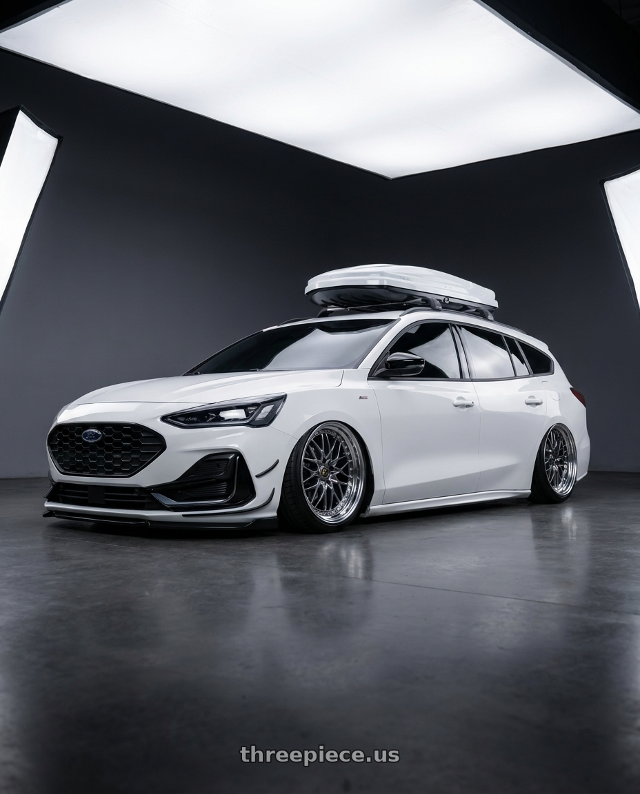 2023 ford focus wagon with Work Vs-Xv 5x100 18x8.5+40 O Disk Brilliant Silver Black wheels front three quarter view stanced stance